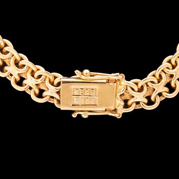 Halsband x-länk 18K guld.