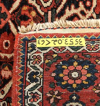 An antique Bachtiari carpet ca 205 x 134 cm.