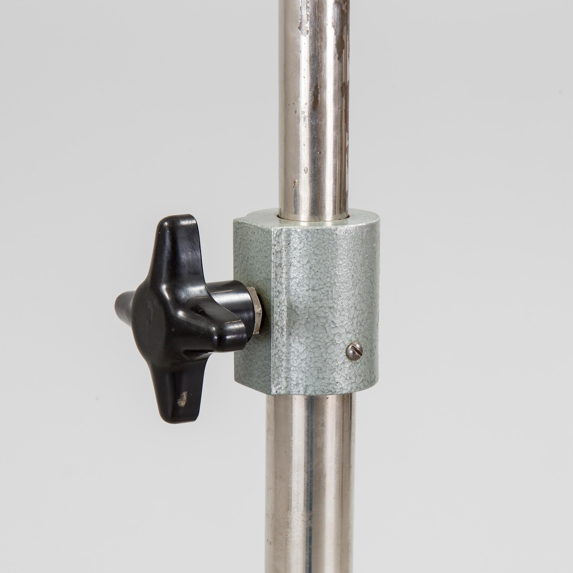 A German metal floor light from the mid 20th century.