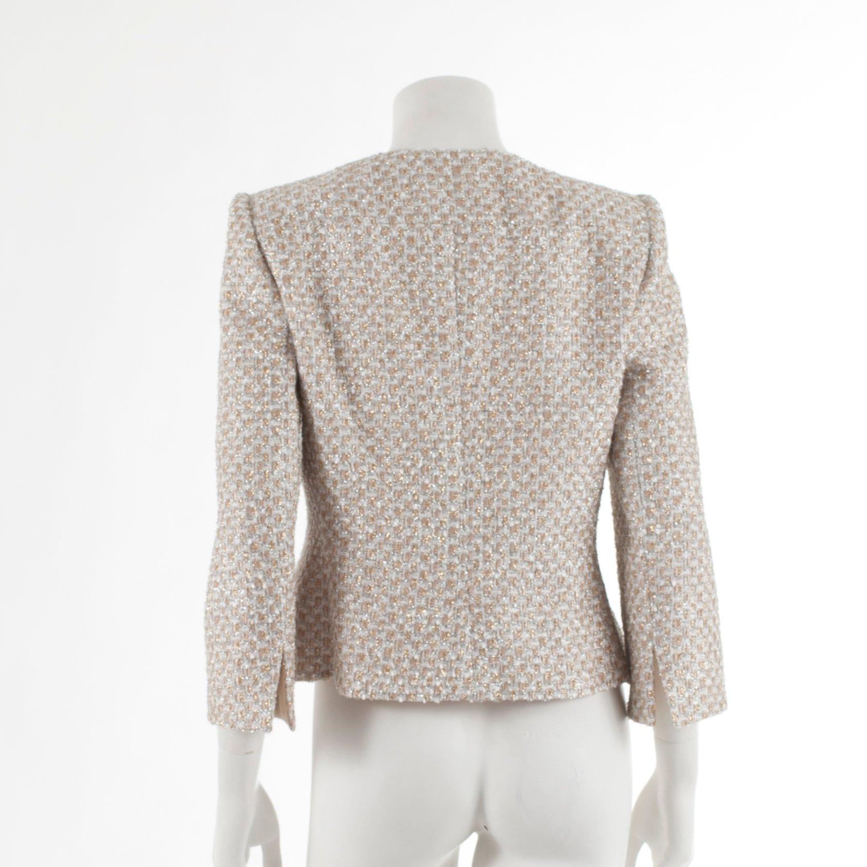 ARMANI, a silver and gold colored evening jacket. Italian size 44.