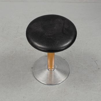 A mid 20th century stool with crome foot and leather coated seat.