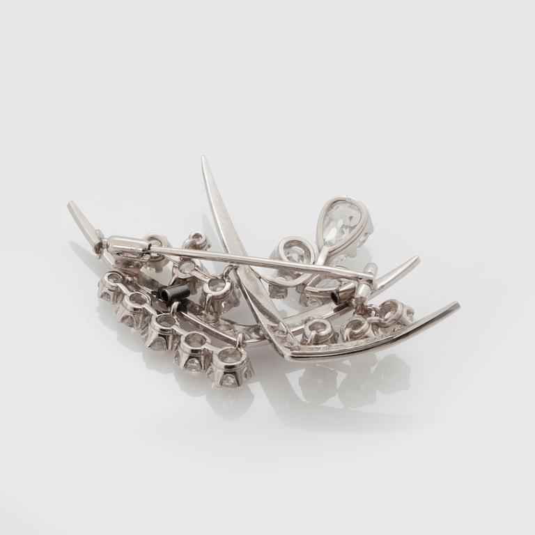 A TIARA with cultured pearls and a detachable brooch set with old-cut diamonds.