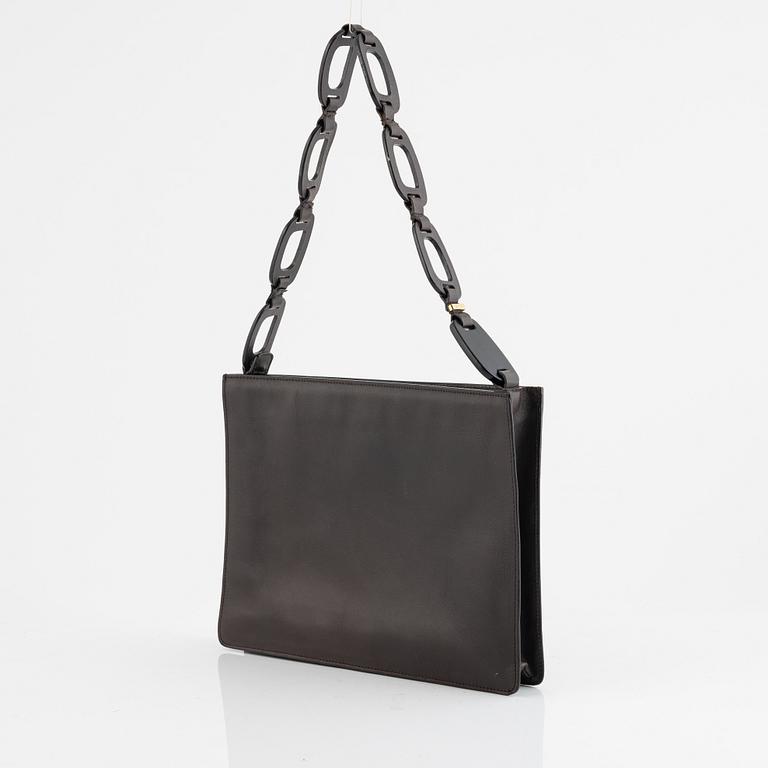 Gucci, a handbag.
