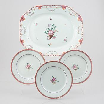 A Famille Rose export porcelain serving dish and three plates, China, Qianlong (1736-95).
