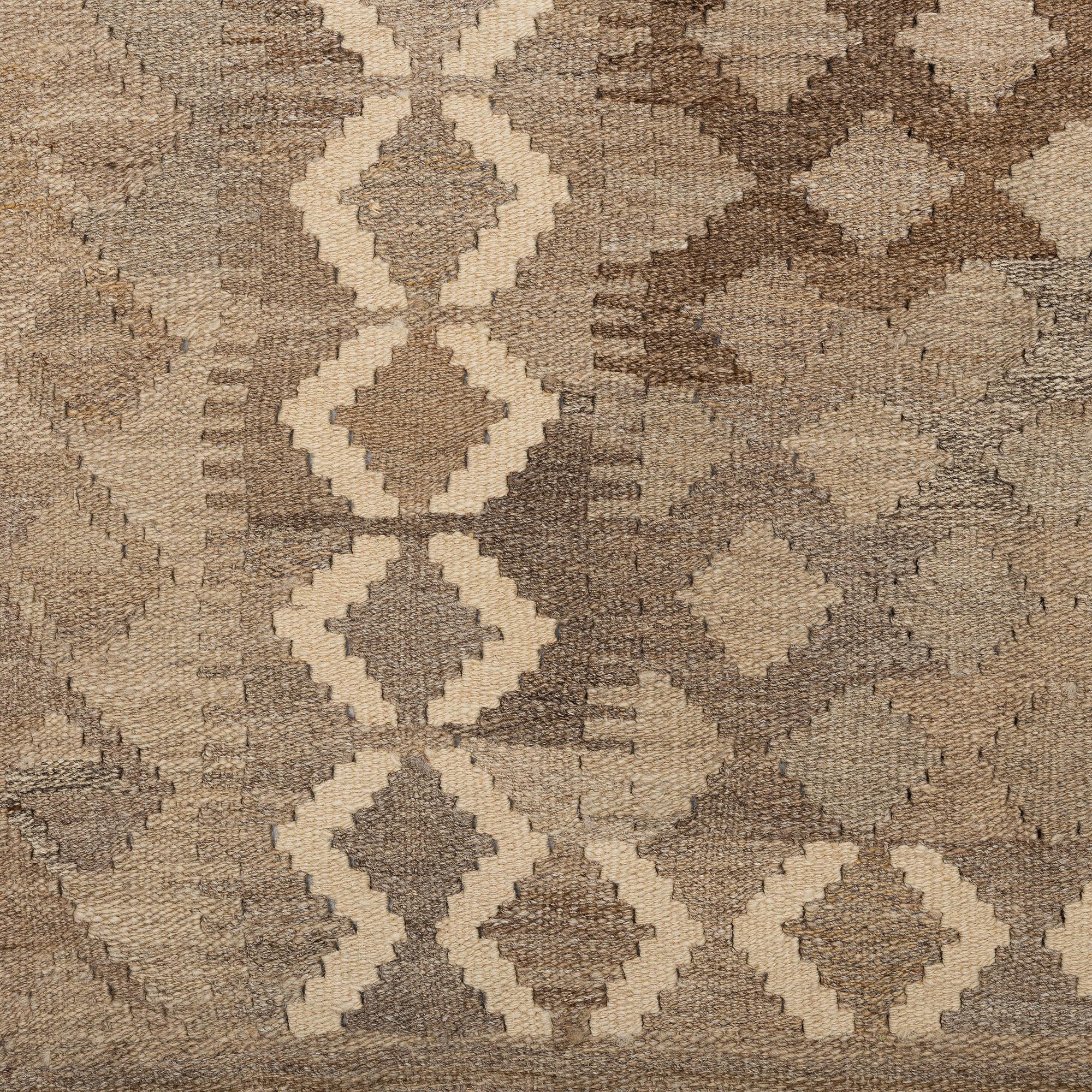 A carpet, kilim, around 254 x 160 cm.