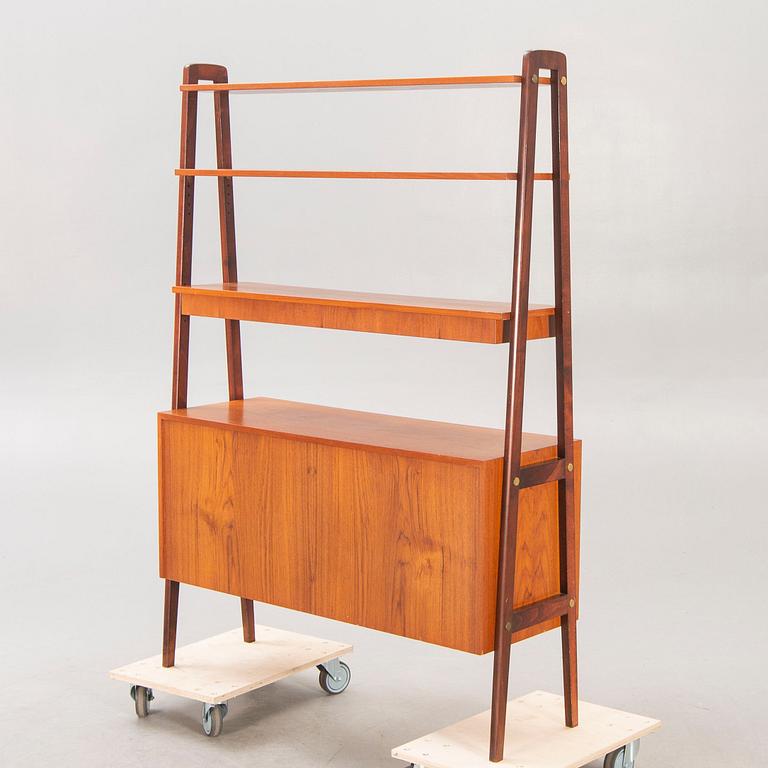 A teak mid 1900s book shelf.