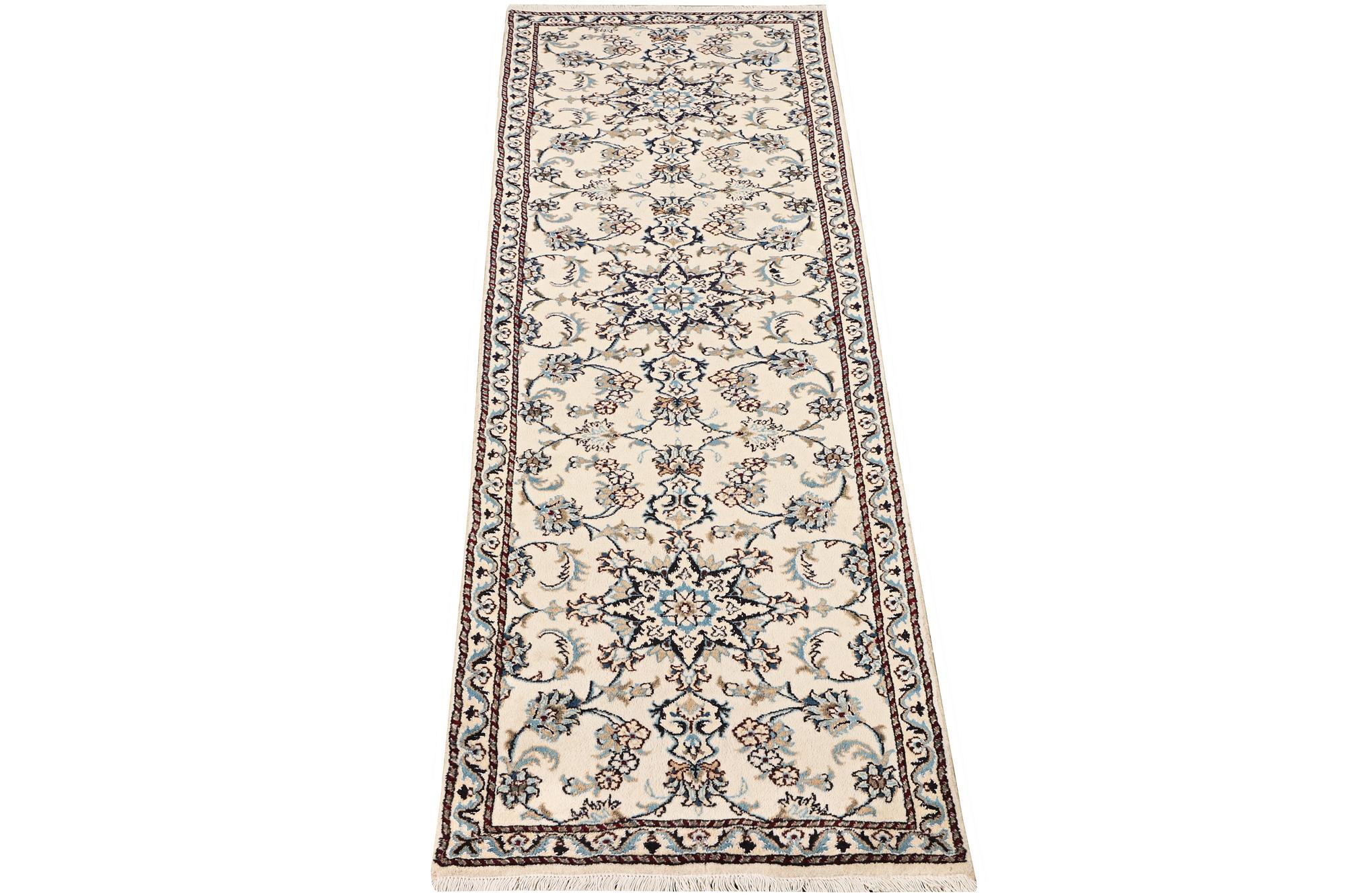 A Nain runner carpet, part silk, c. 298 x 80 cm.