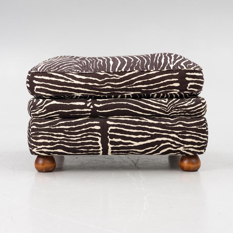 Josef Frank, a model 336 ottoman, Svenskt Tenn.