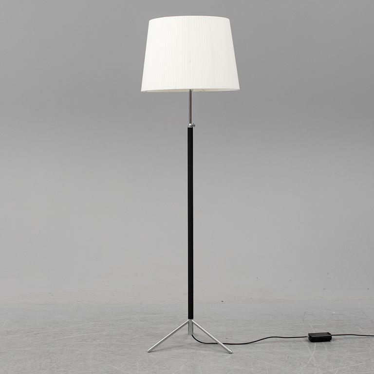 Three contemporary floorlamps by Santa & Cole.