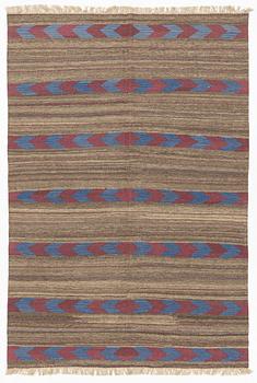 A Persian Kilim carpet, c. 297 x 203 cm.