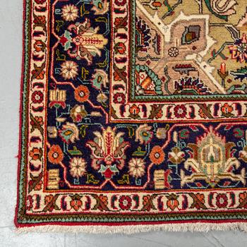 A carpet, Tabriz, ca 345 x 240 cm.