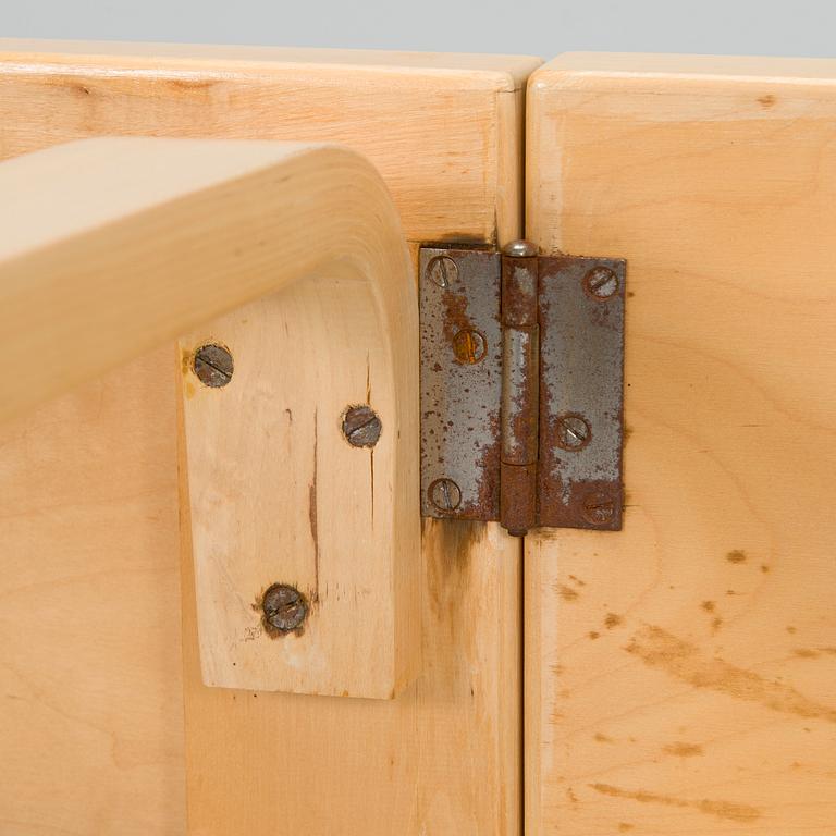 Alvar Aalto, A mid-20th century drop leaf table and three chairs for O.Y. Huonekalu-ja Rakennustyötehdas A.B.