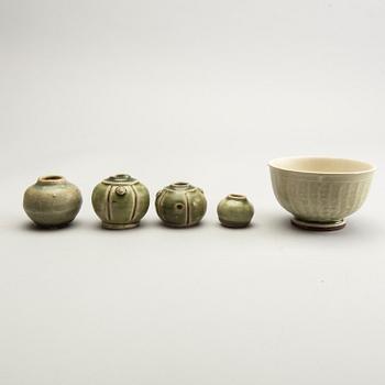 A group of olive green glazed vessels, South East Asia, presumably Thailand.