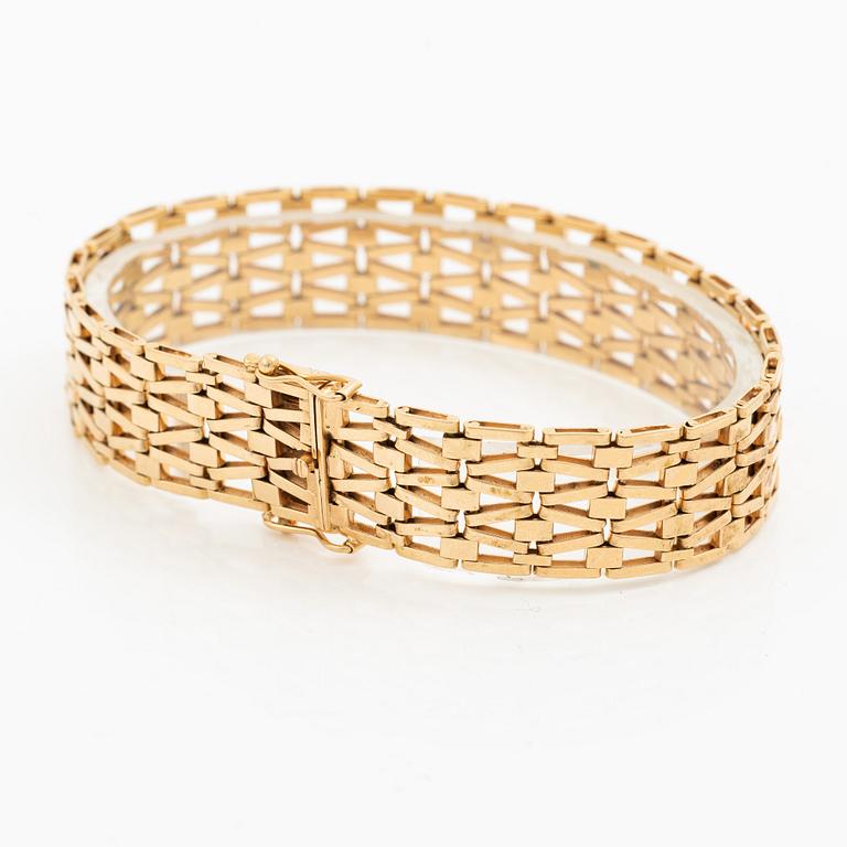 Arm bracelet, 18K gold.