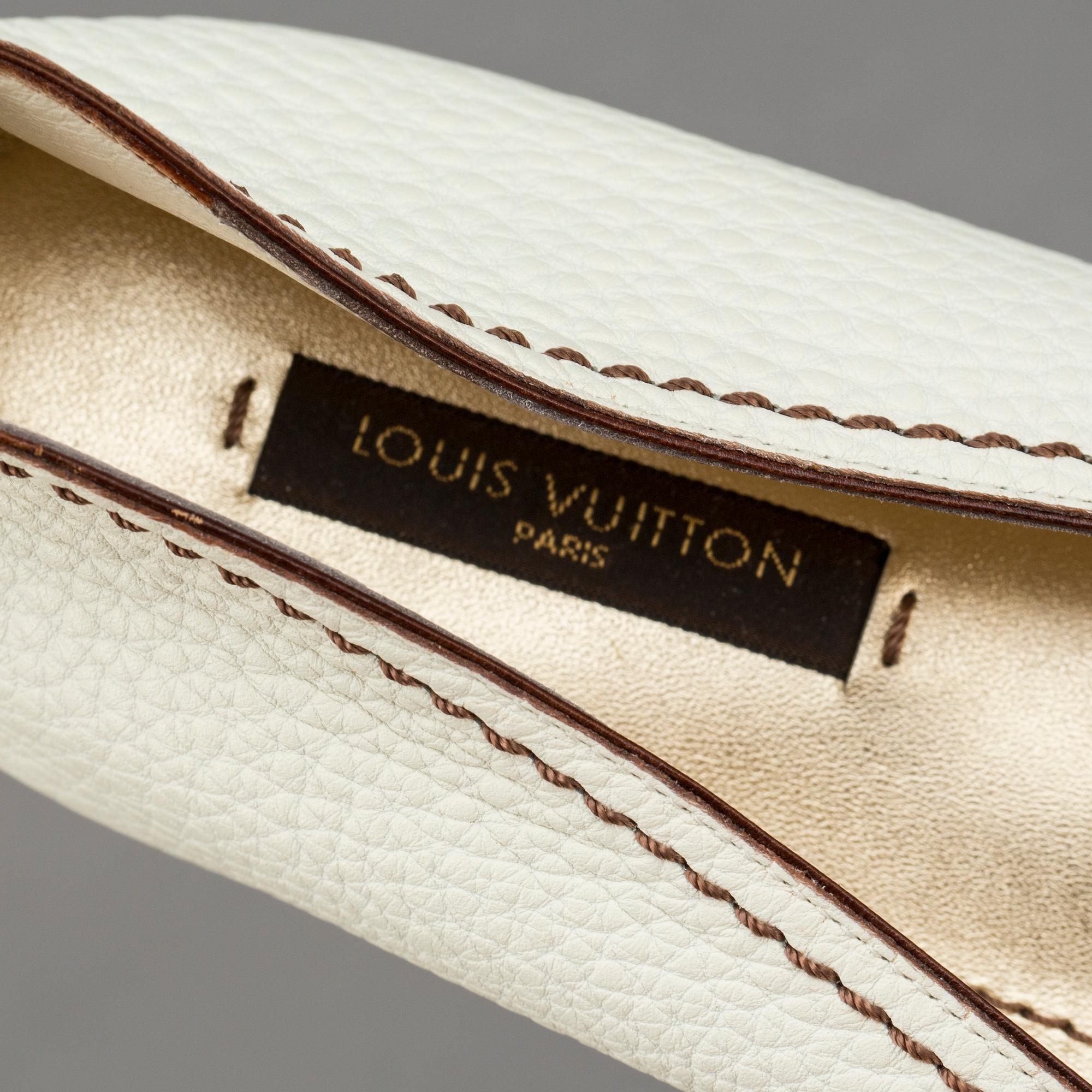 SKOR, Louis Vuitton.
