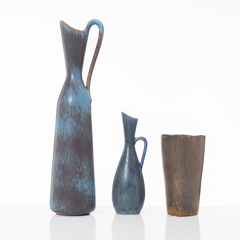 Carl-Harry Stålhane and Gunnar Nylund, two stoneware pitchers jugs and a vase, Rörstrand.