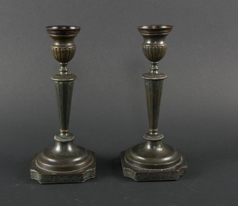 LJUSSTAKAR, ett par, brons, senempire, 1800-talets andra hälft.