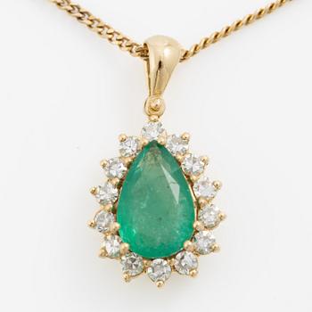 Gold necklace with a drop-shaped emerald and octagon-cut diamonds.
