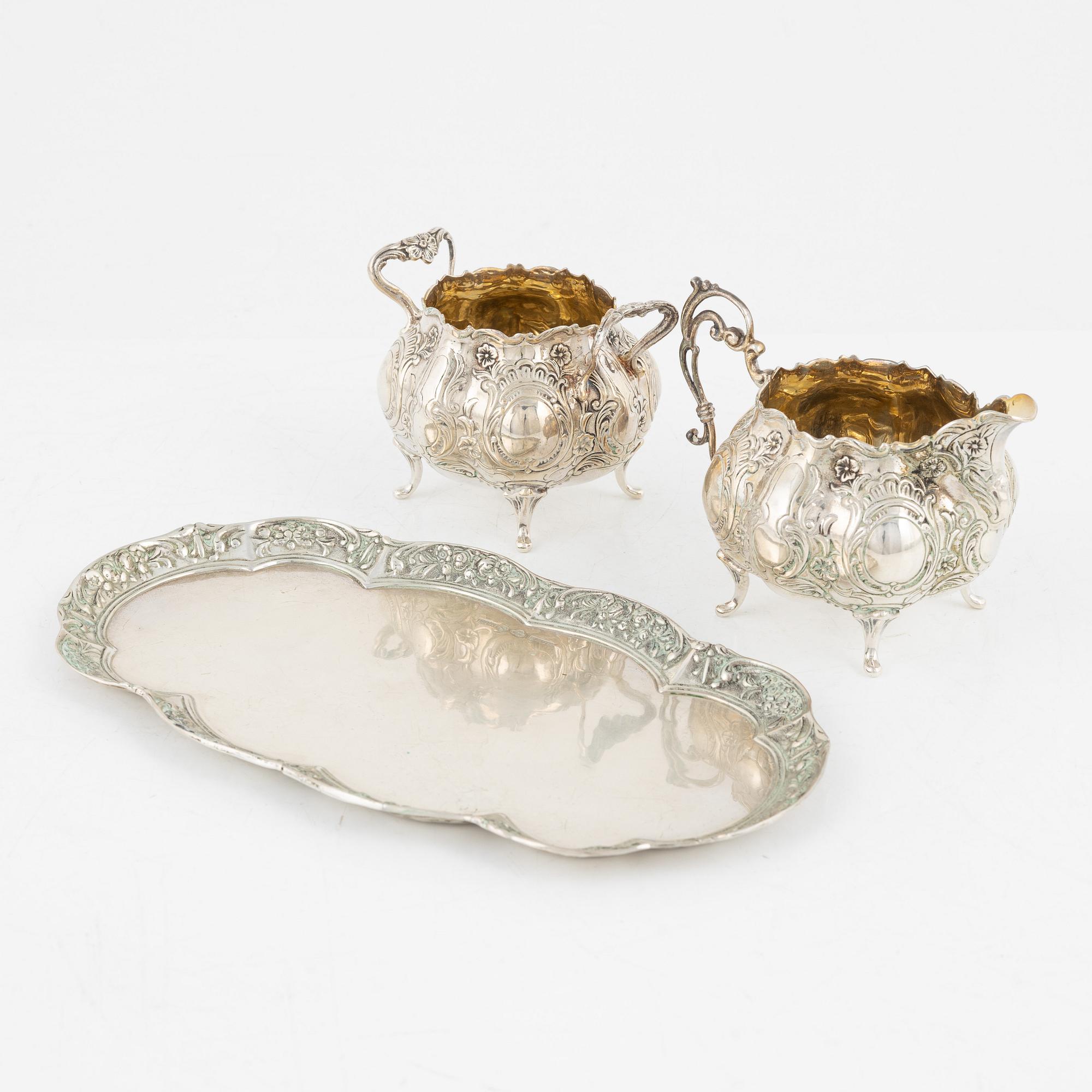 A silver Rococo style creamer, sugar bowl and tray, Gewe Silvervarufabriken Ab, Malmö, Sweden, 1970-71.