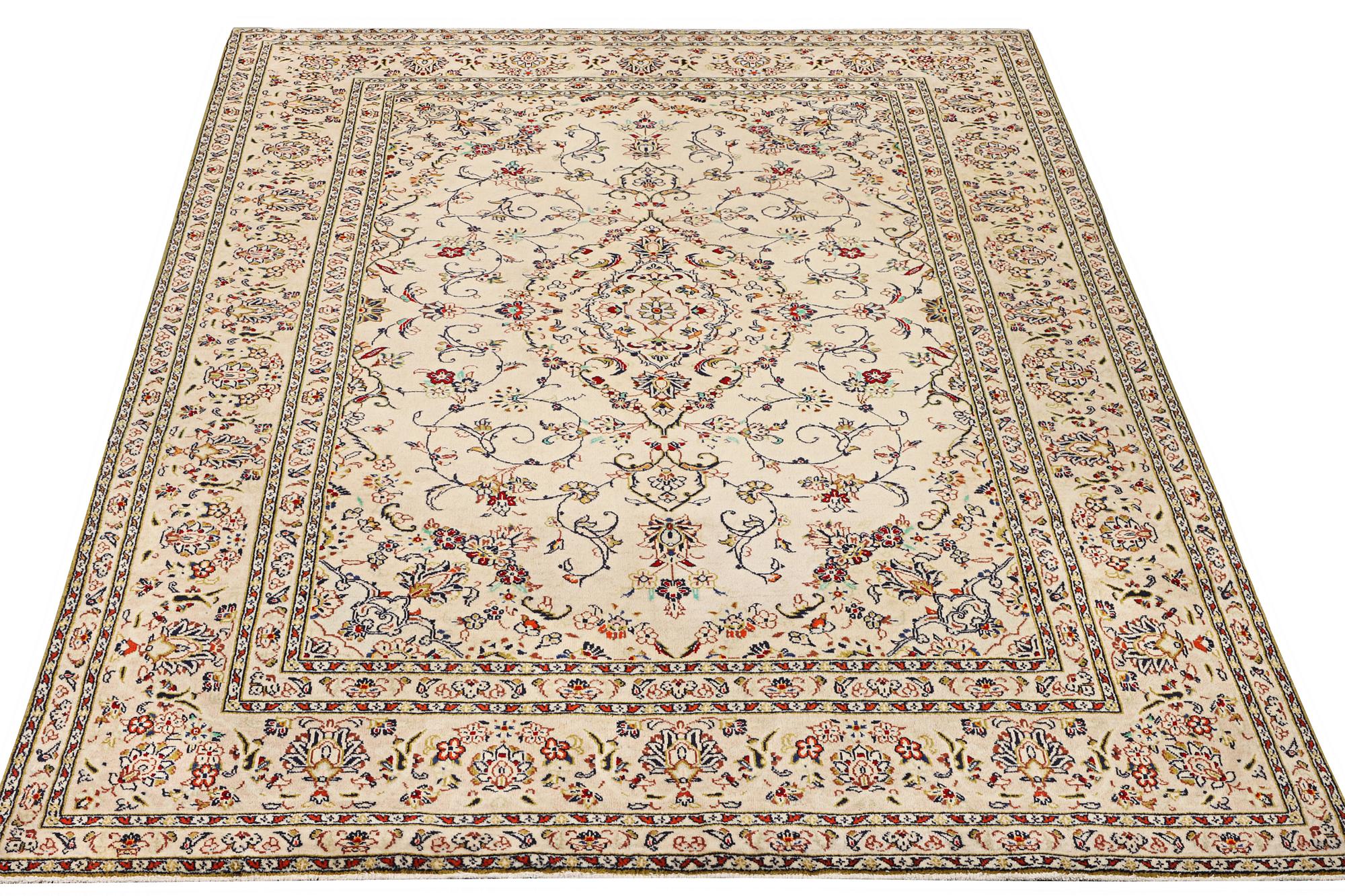 A Kashan carpet, a. 293 x 198 cm.
