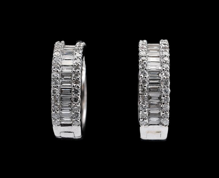 A PAIR OF EARRINGS, Brilliant and baguette cut diamonds c. 1.30 ct. Weight 5,4 g.