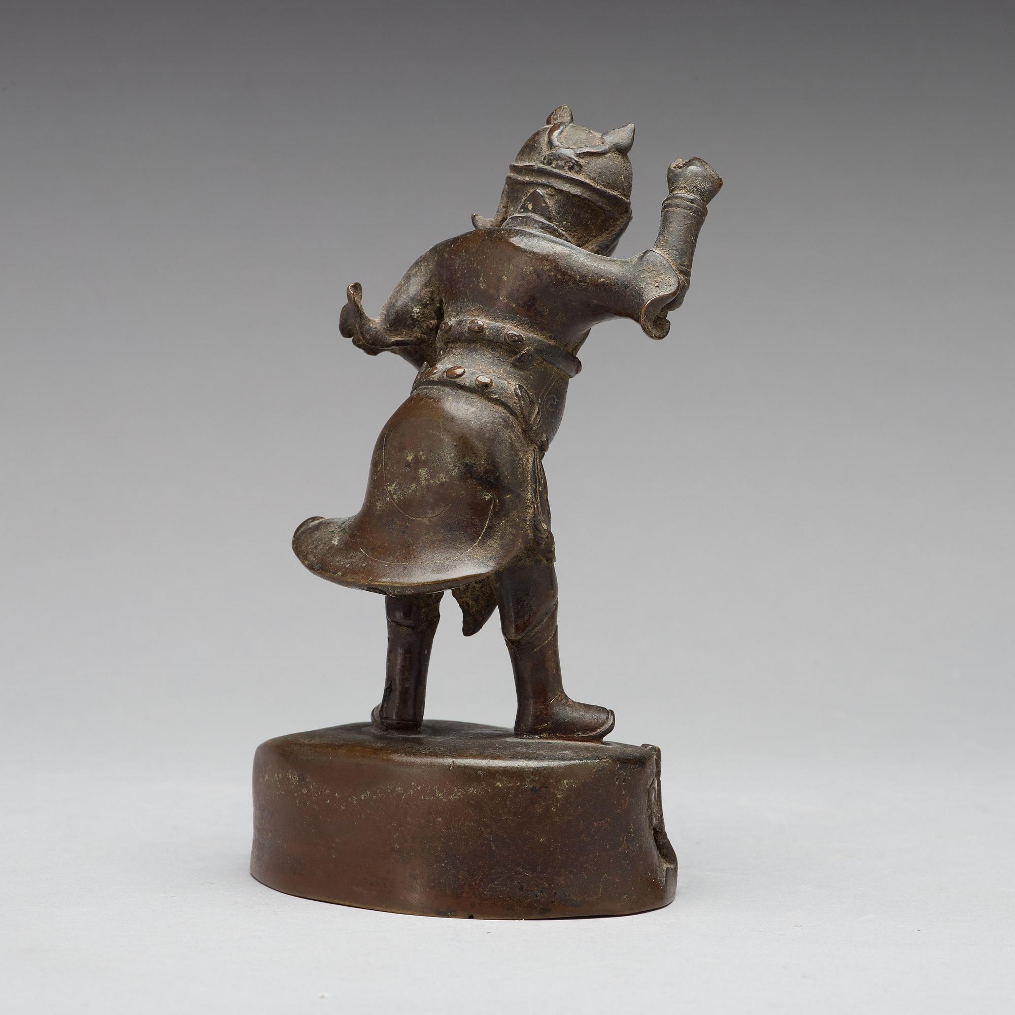 A bronze figure of a deity, Qing dynasty, 17/18th Century.