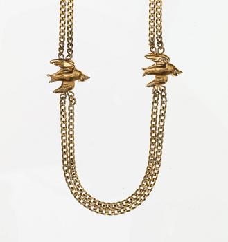 An Estrid Ericson yellow metal necklace with gilt pewter pigeons, Svenskt Tenn.