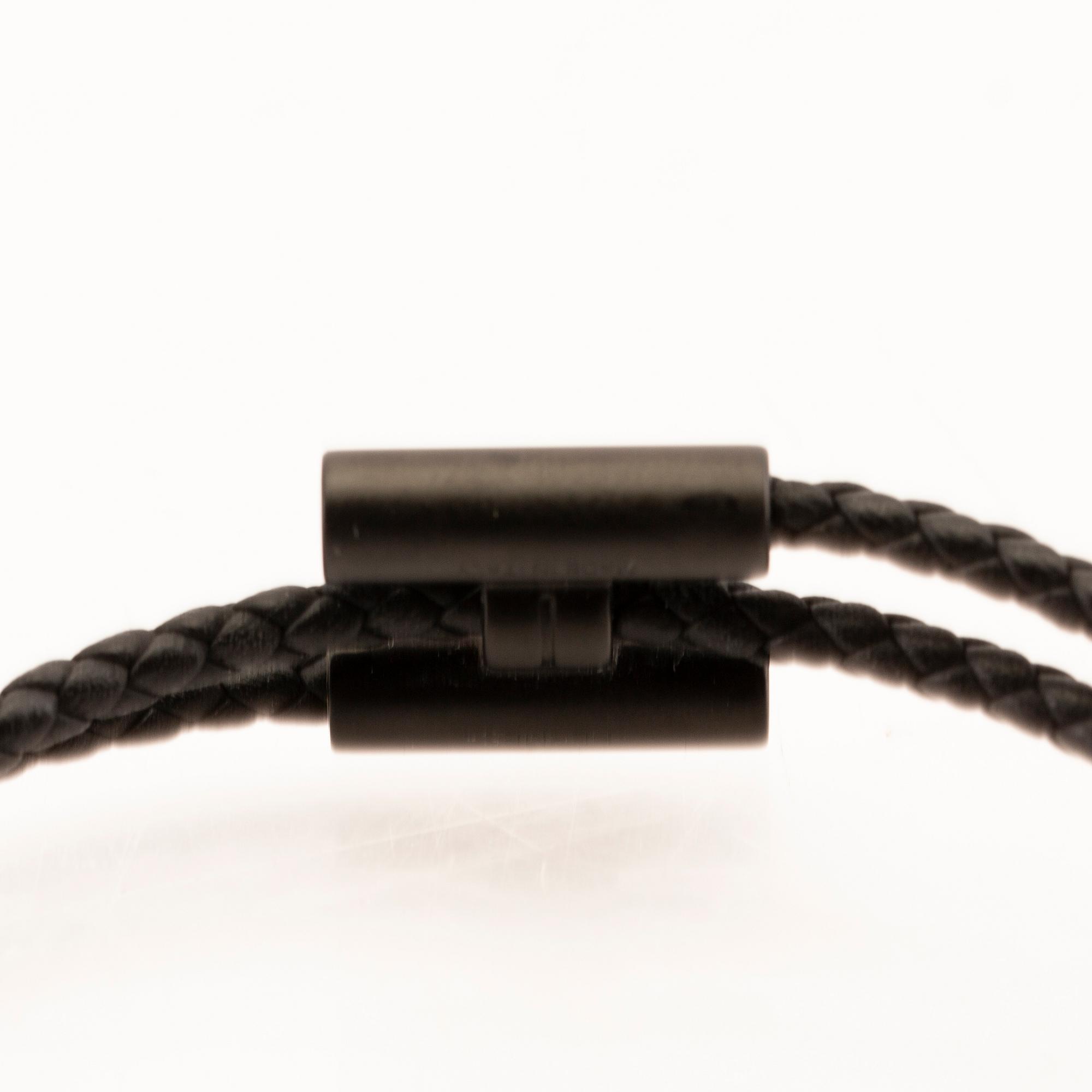 Hermès, armband "Tournis Tresse Bracelet".