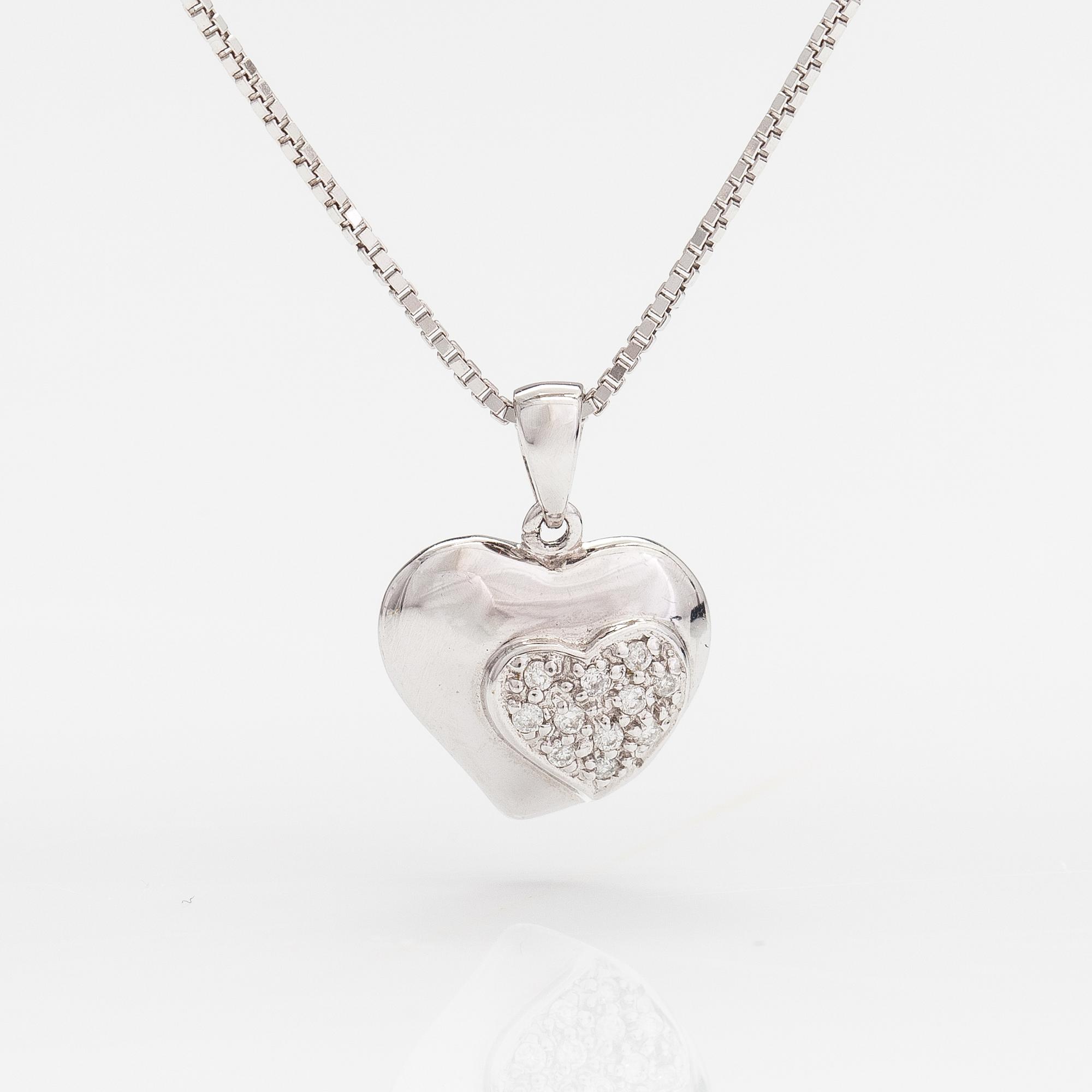 A 14K and 18K white gold necklace with diamonds ca. 0.055 ct in total.