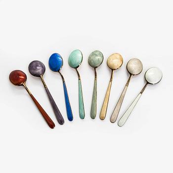 Tillander, an 8-piece set of enamelled and gilt sterling silver coffee spoons, Helsinki 1953. In original box.