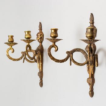 A pair of early 20th century gustavian style wall-lights.