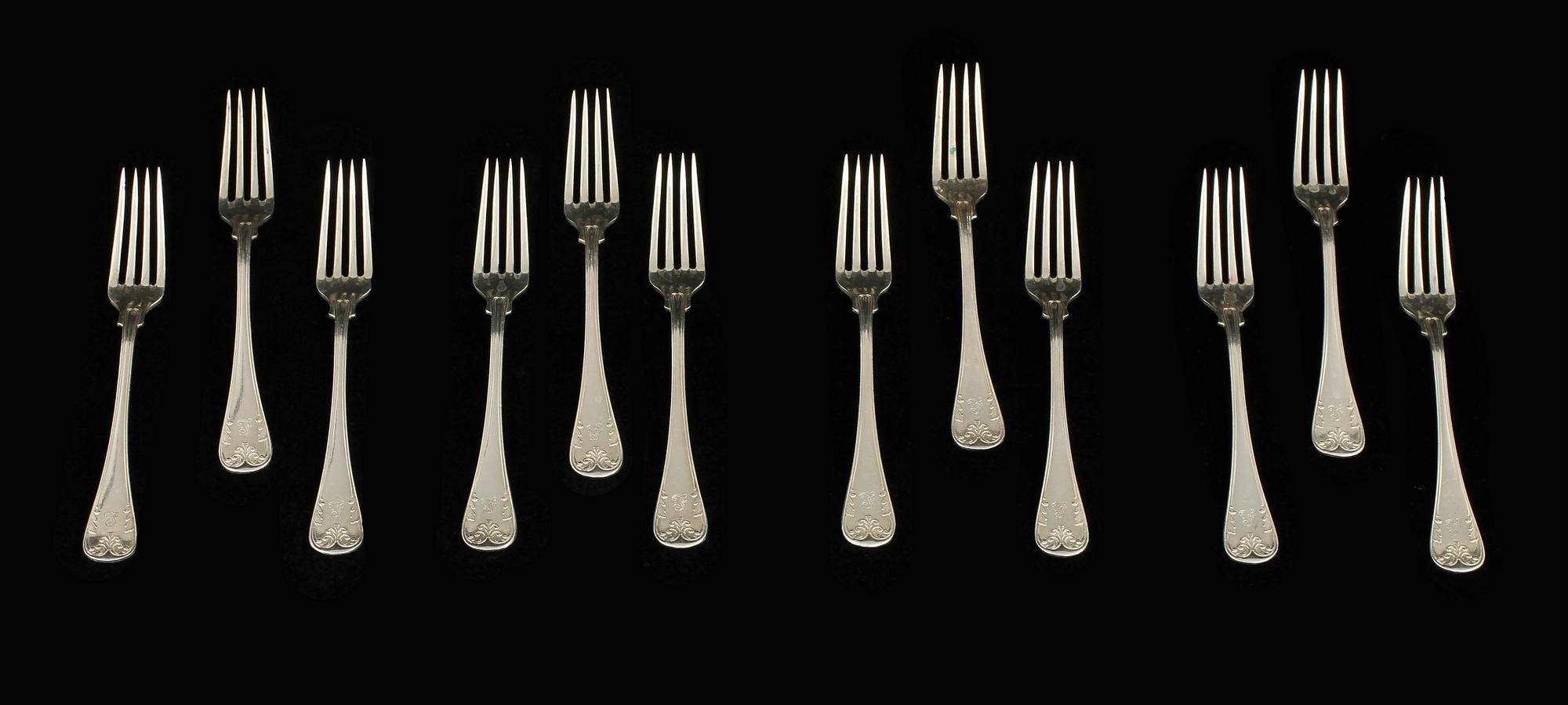 PARTI GAFFLAR, 20 st, silver, "Fransk lilja", mestadels GAB, Stockholm, 1900-talets första hälft. Vikt 765 g.