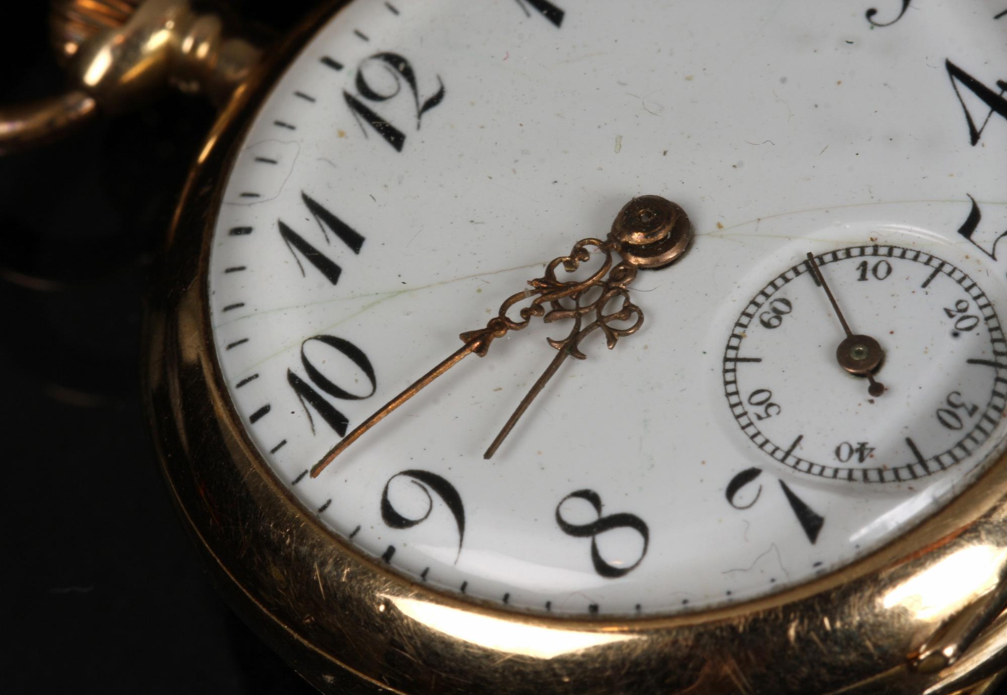 KLOCKA samt KLOCKKEDJA, guld, 14 k samt 18 k.