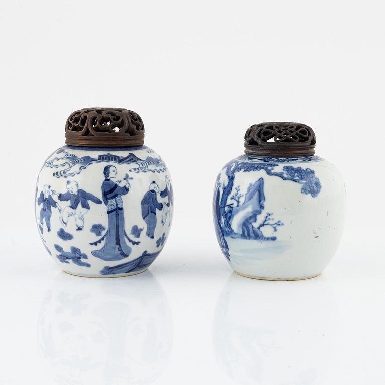 Two similar blue and white lidded urns, China, 19th century.