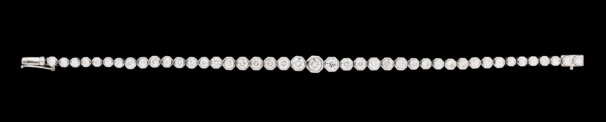 A white gold and diamond bracelet.