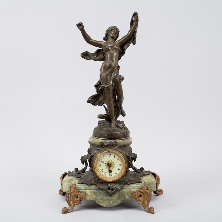 A bronze, green stone table clock, 'La Merveilleuse', after Auguste Moreau, 20th century.