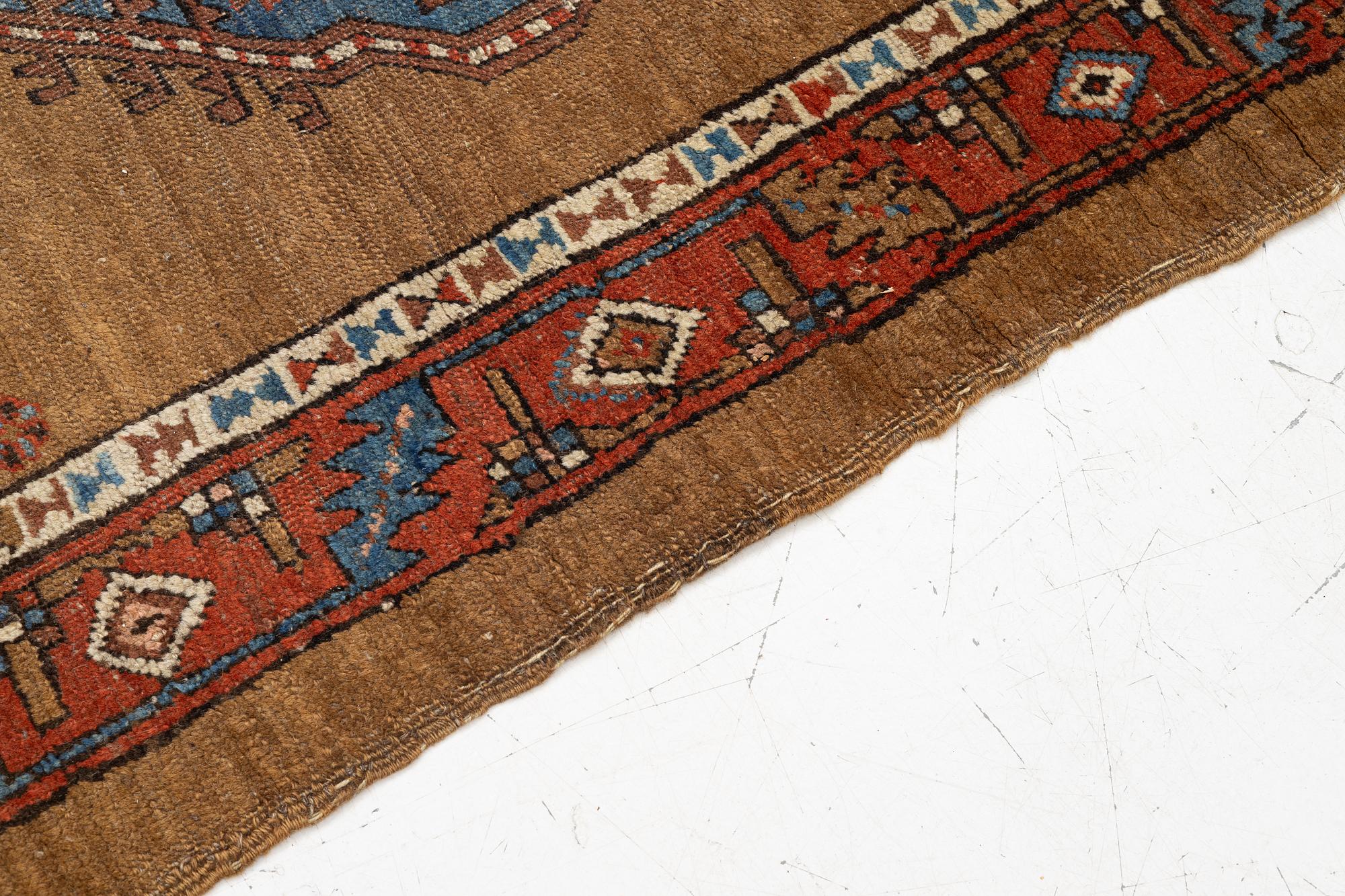 An antique Sarab rug, northwestern Iran, c. 213 x 107 cm.
