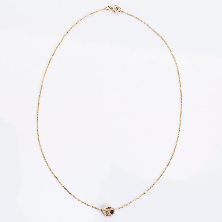 An 18K/14K gold necklace, pendant with sapphire and small pearls.