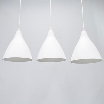 Lisa Johansson-Pape, three 1950s '1314' pendant lights for Stockmann Orno.