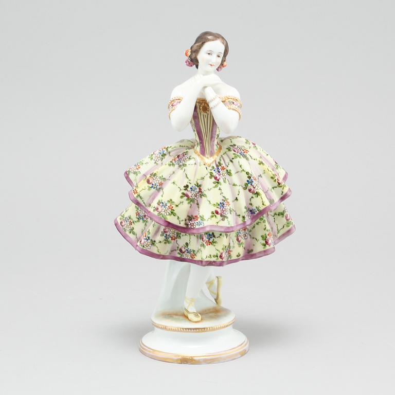 A porcelain figurine by Aelteste Volkstedter Porzellanmanufaktur in Rudolfstadt, made around year 1900.