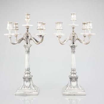 A pair of Swedish silver candelabras, mark of Svea Svensson, Stockholm 1908.