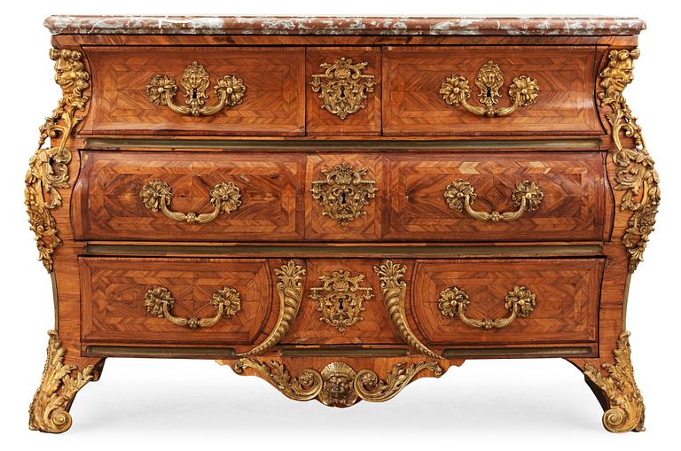 A French Régence 18th century commode in the manner of F. Mondon.