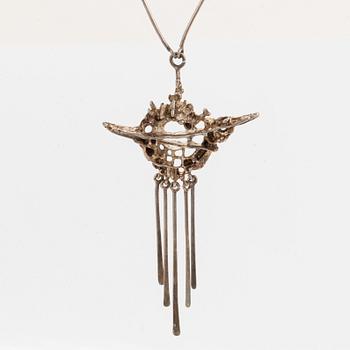 A silver necklace by Juhls.