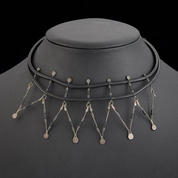 Vivianna Torun Bülow-Hübe, a leather and silver necklace and a pair earrings, studio work Stockholm ca 1950-55.