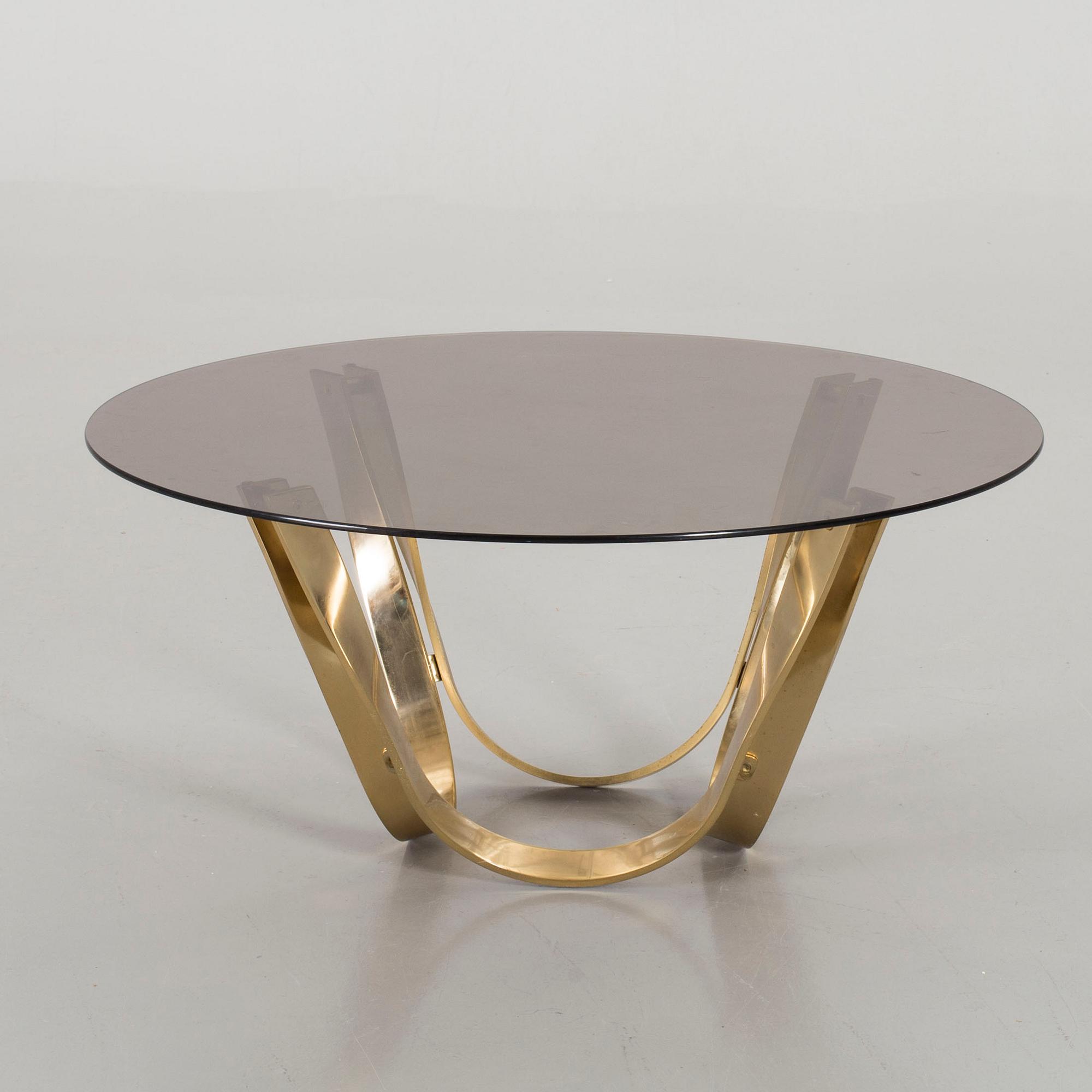 A GLASS TOP COFFEE TABLE BY ROGER SPRUNGER FOR DUNBAR USA.