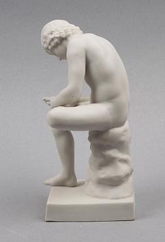 FIGURIN, parian, "Törnutdragaren". 1900-tal.