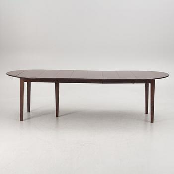 A hardwood dining table, bought at Newport, 21st century.