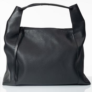 Gucci, A black leather hobo bag.