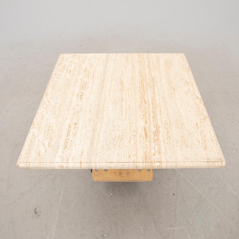A late 20th century travertin coffee table.