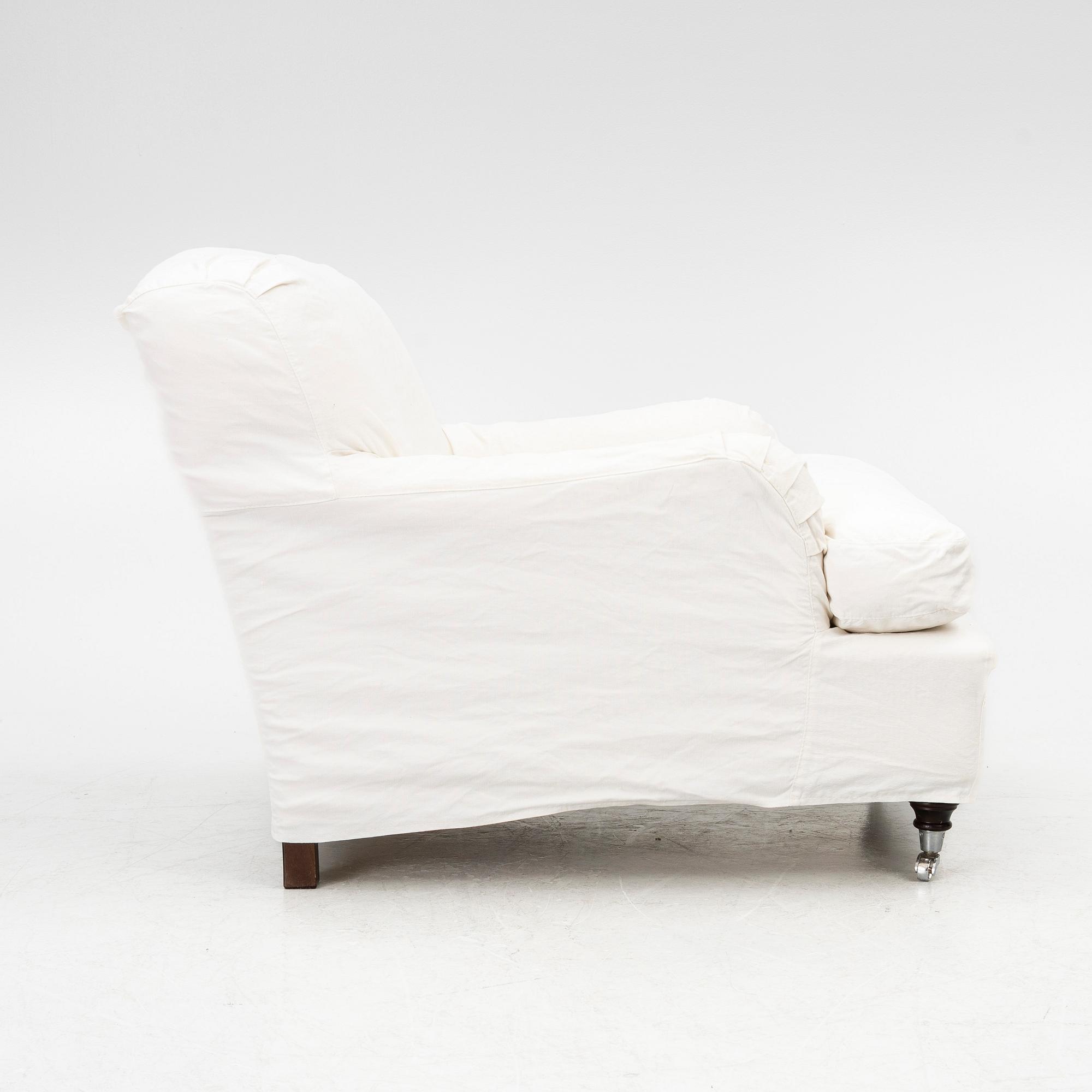 A Howard model armchair, contemporary.